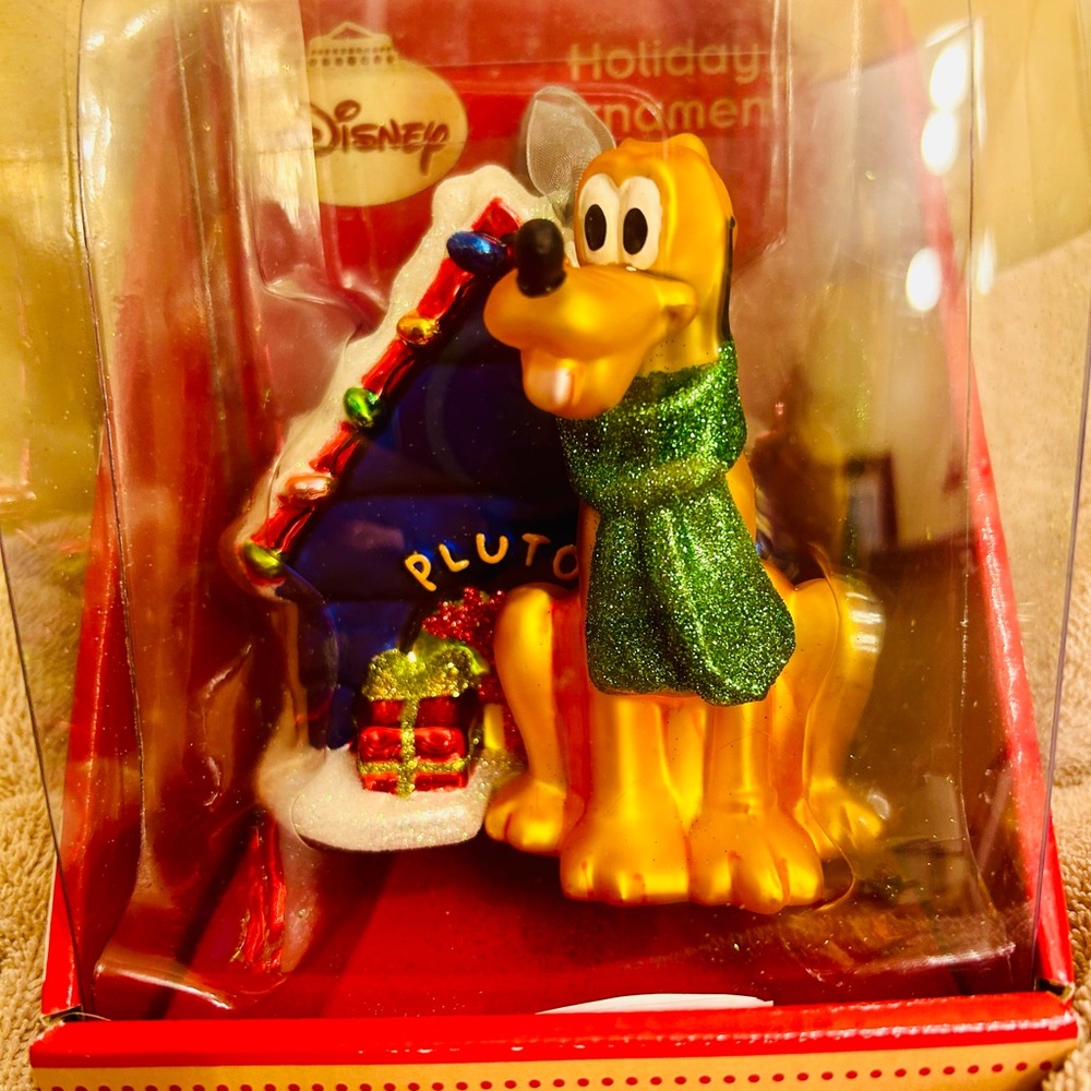 Disney Pluto Christmas ornament never taken out of box.